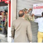 Establecimientos comerciales chinos clausurados estarían operando como dueños de dominicanos